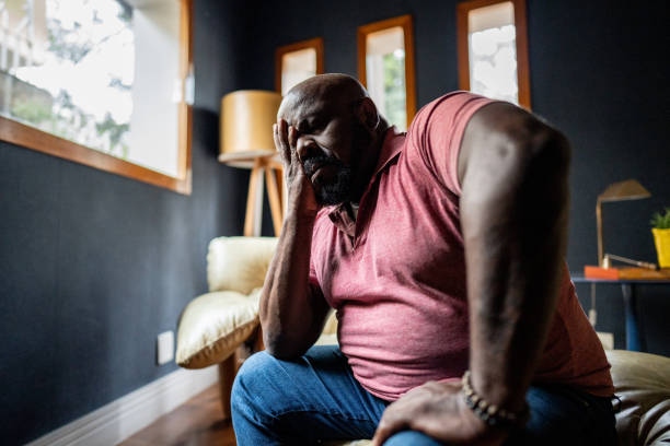 Worried mature man at home